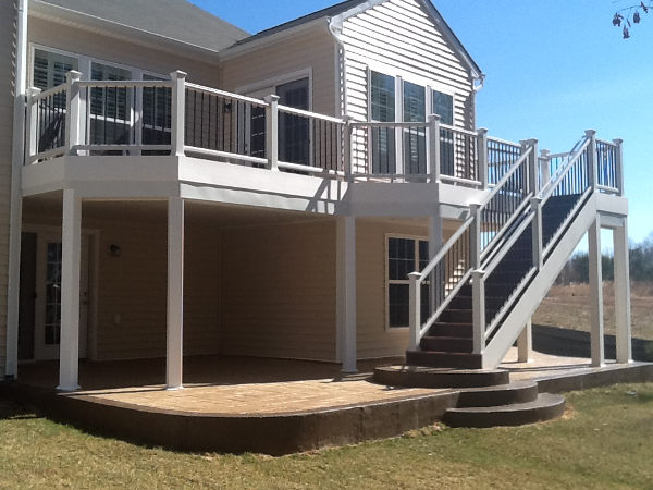 second story deck with stamped patio